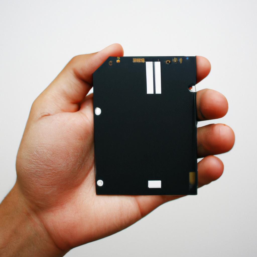 Person holding solid-state drive